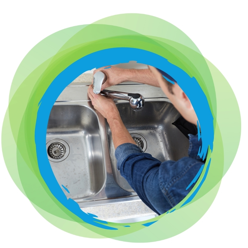 Professional Plumbers in Ropes Crossing fixing a kitchen faucet, ensuring reliable and efficient plumbing solutions for residential needs.