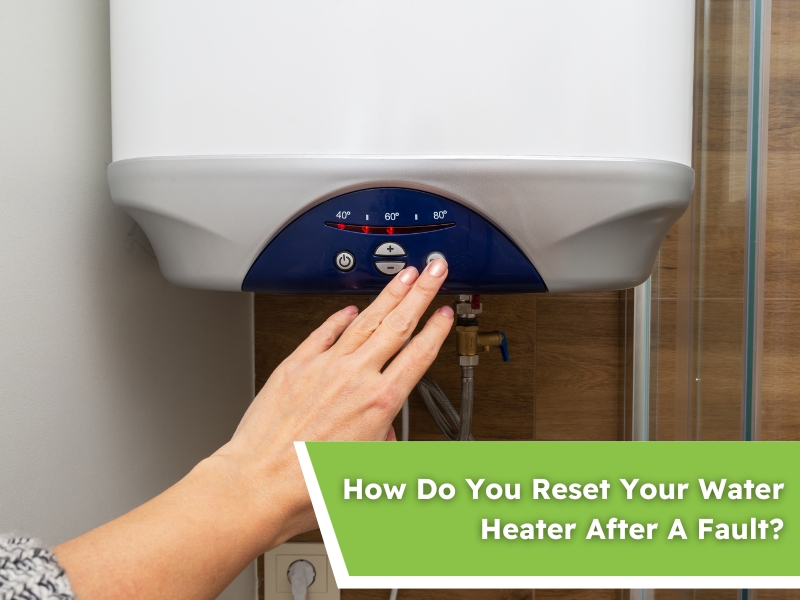 A person pressing the control panel of a water heater, demonstrating how to reset water heater after a fault.