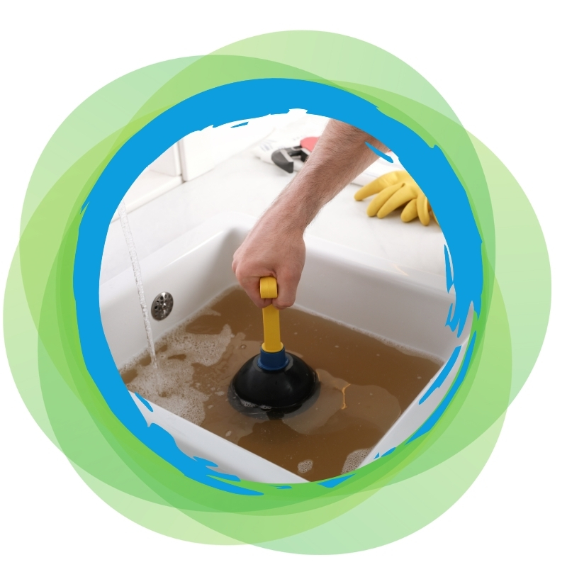 Plumber using plunger on kitchen sink blocked drain with dirty water overflow.