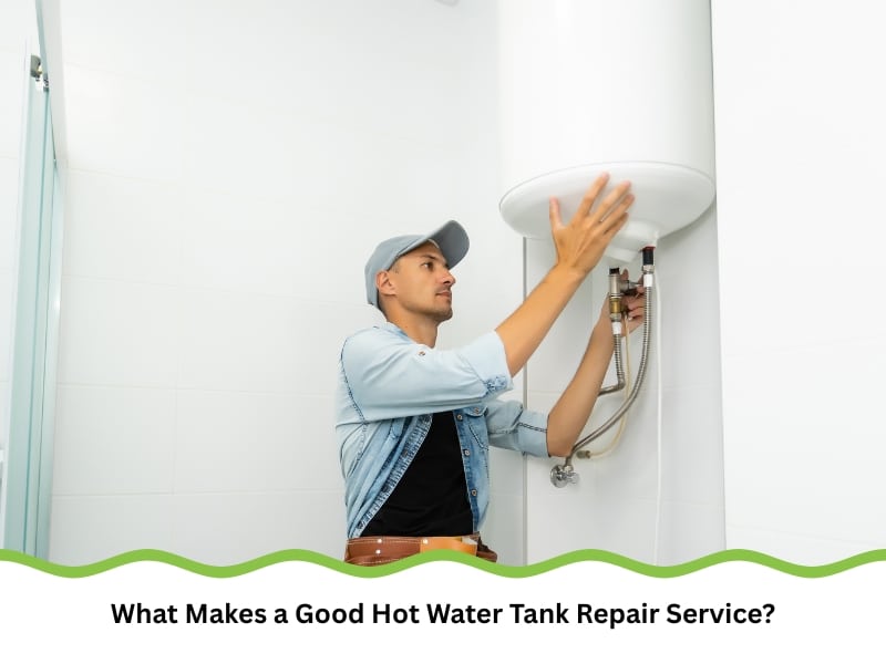 Plumber inspecting unit during hot water tank repair service.